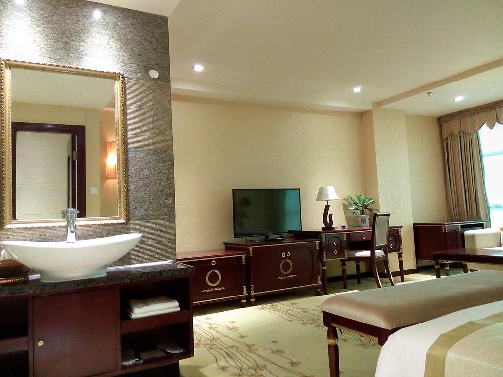 Guangzhou Li Gang Hotel גואנגג'ואו חדר תמונה