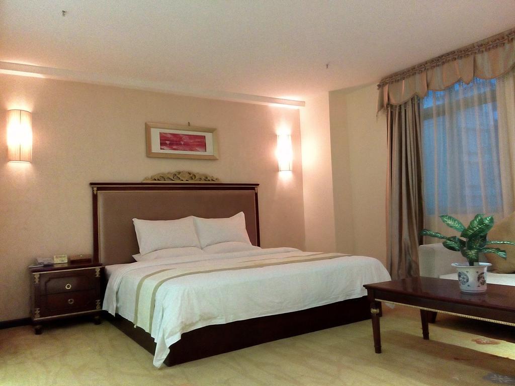 Guangzhou Li Gang Hotel גואנגג'ואו חדר תמונה